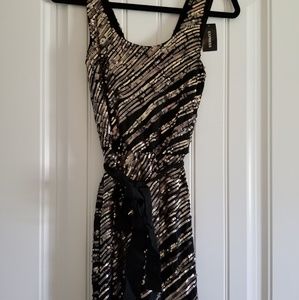 Black Express cocktail dress with gold sequins